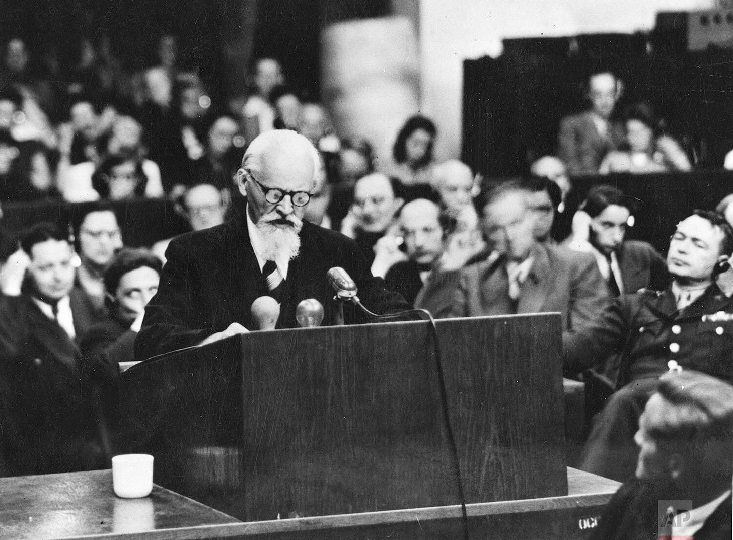 Hermann Schmitz, former I.G. Farben chairman, delivers his final plea at the U.S. Military Tribunal in Nuremberg on June 11, 1948, concluding his defense with a statement beginning, 'My consci...'