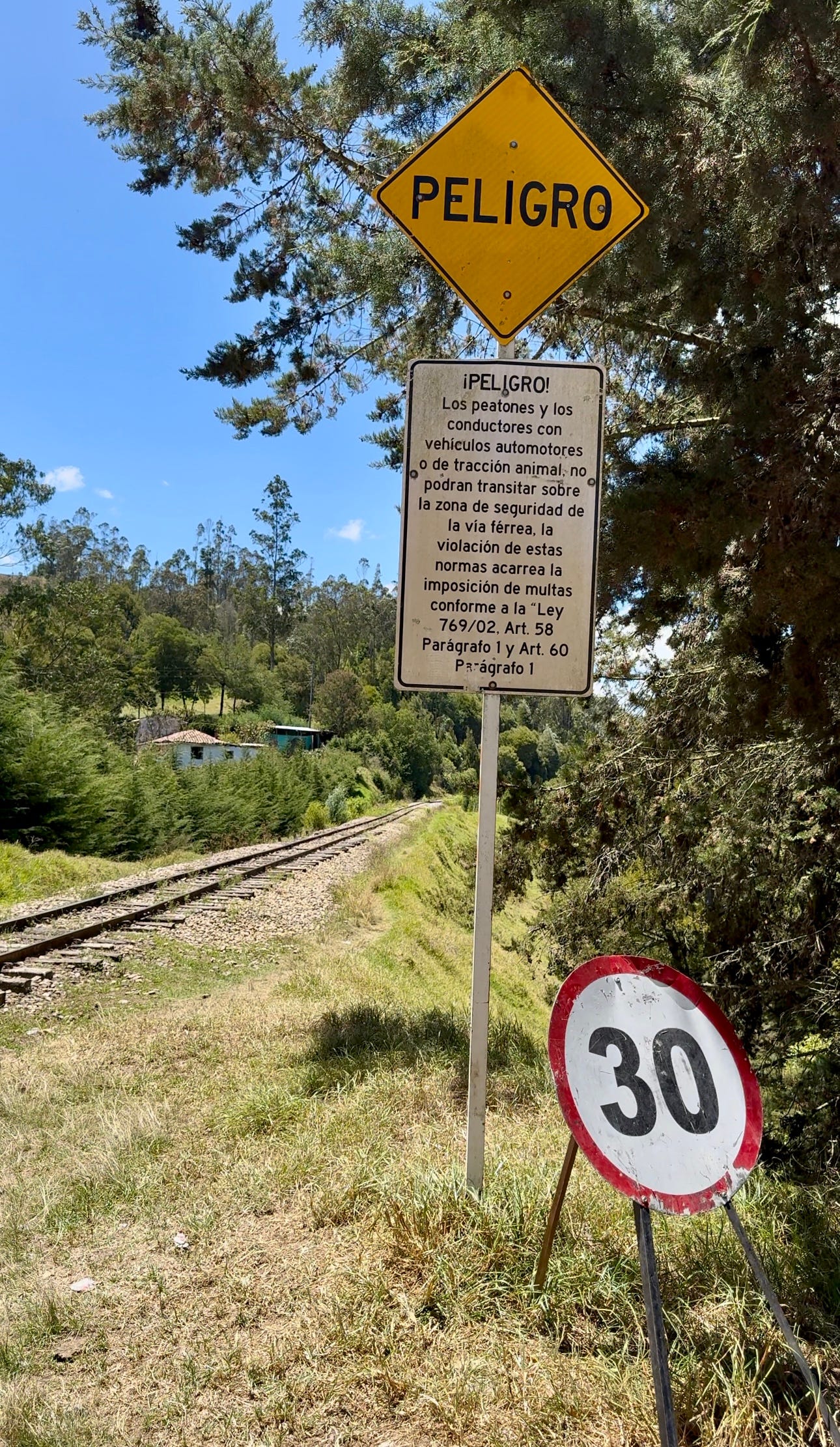 A danger sign at a railroad crossing