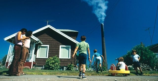 Tacoma smelter smokestack—proof of environmental violence in the Pacific Northwest (Murderland review context)