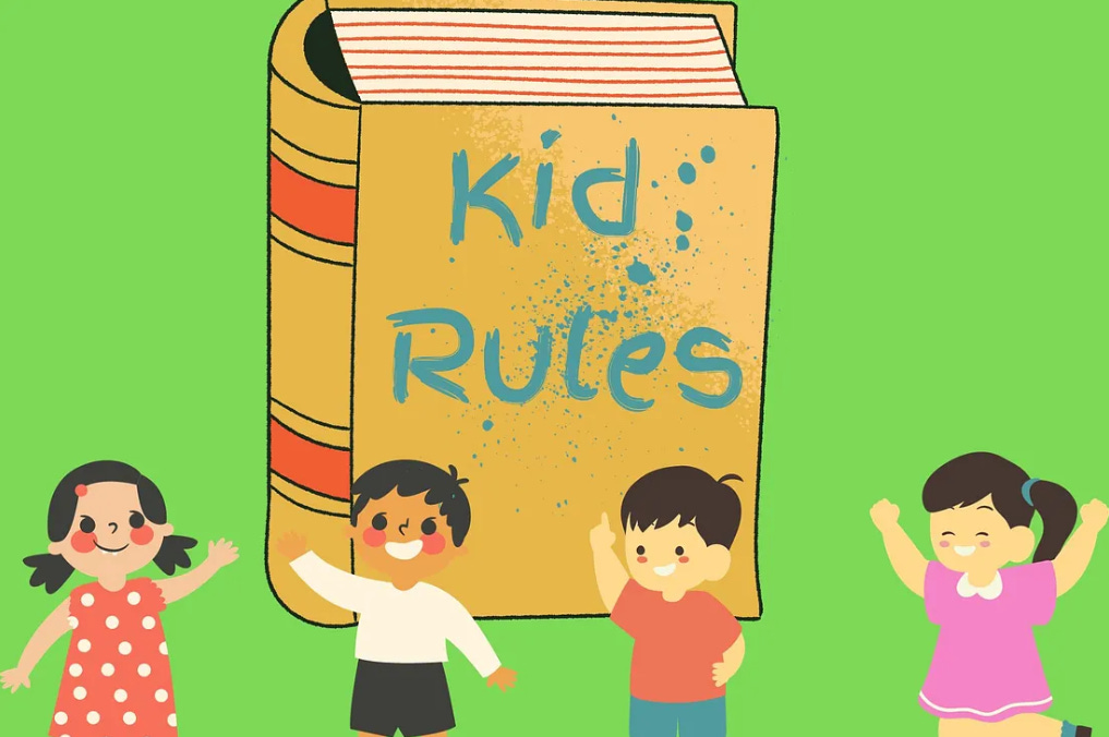 Image shows a Kid Rules book and smiling children 