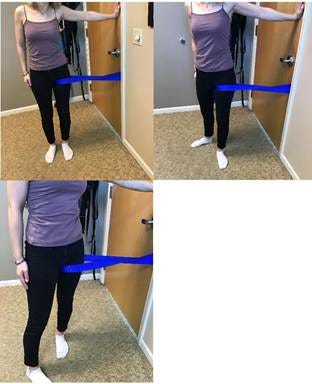 A person standing in a doorway with a blue band

AI-generated content may be incorrect.