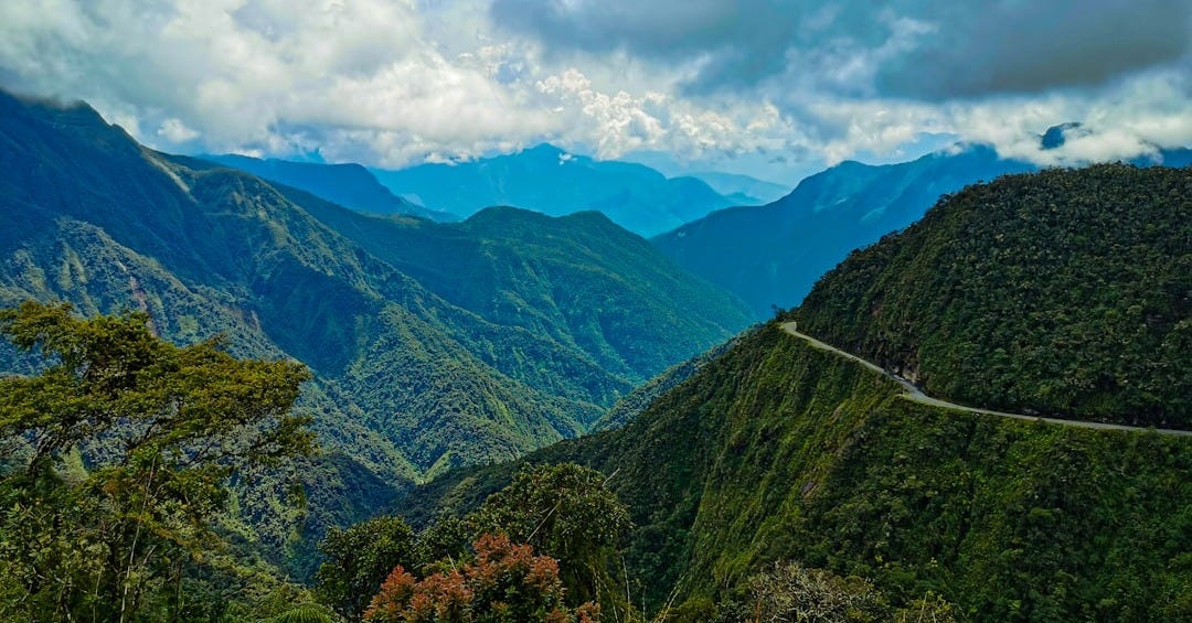 a winding road through a valley