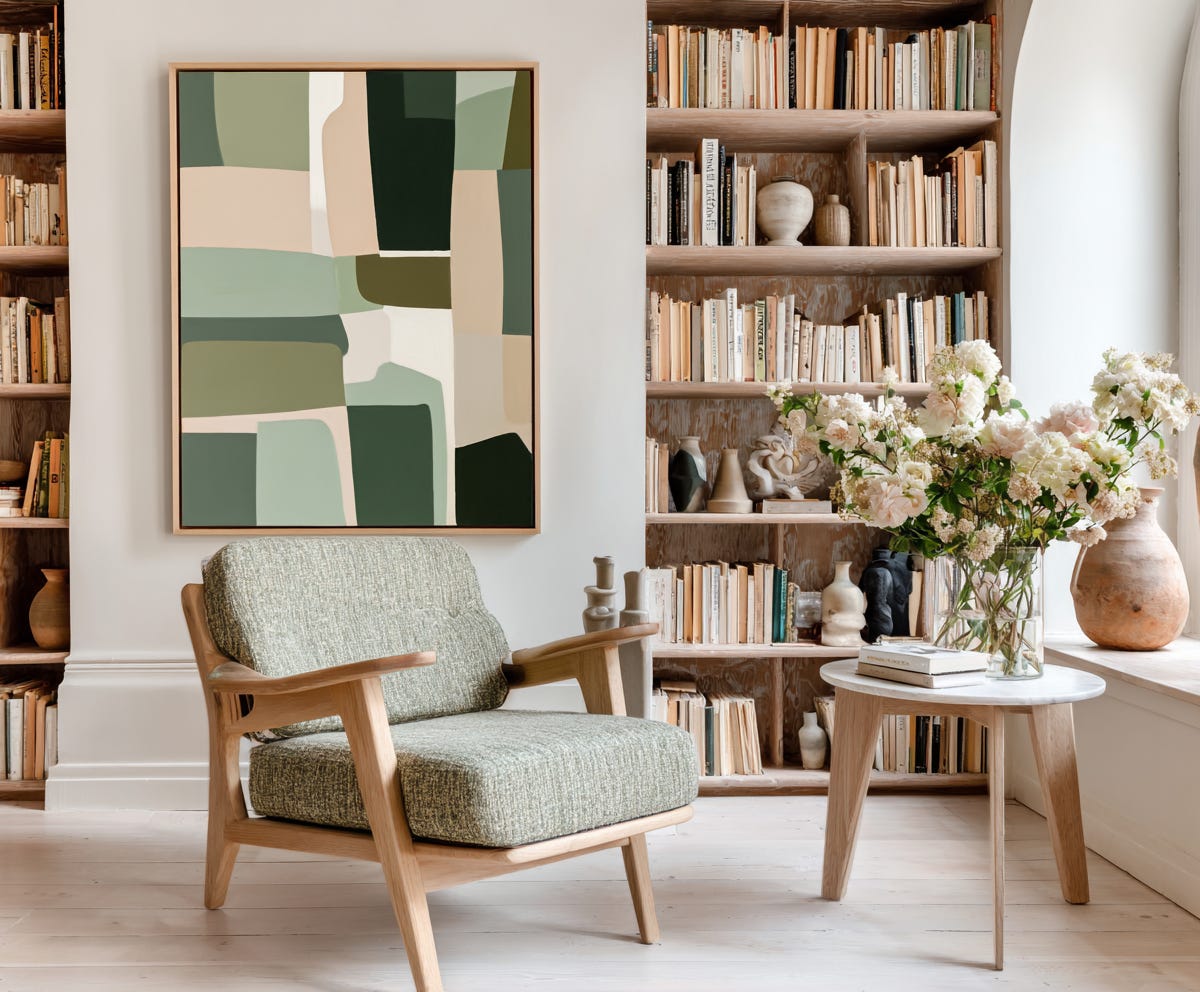 reading nook with Scandi theme in pale woods and green, with curated books in a sunny corner, plush design interiors adelaide