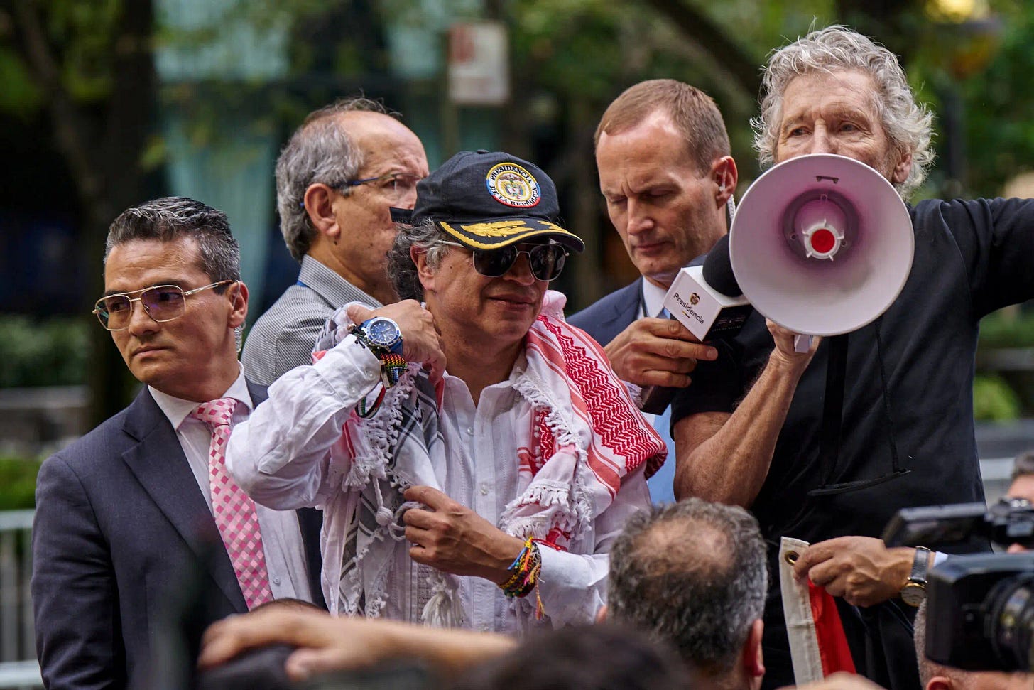 Colombia’s President Gustavo Petro and musician Roger Waters addressing pro-Palestinian demonstrators outside U.N. headquarters in New York City, on Friday, 26 Sept 2025. (Credits: Bing Guan/Reuters/The New York Times)