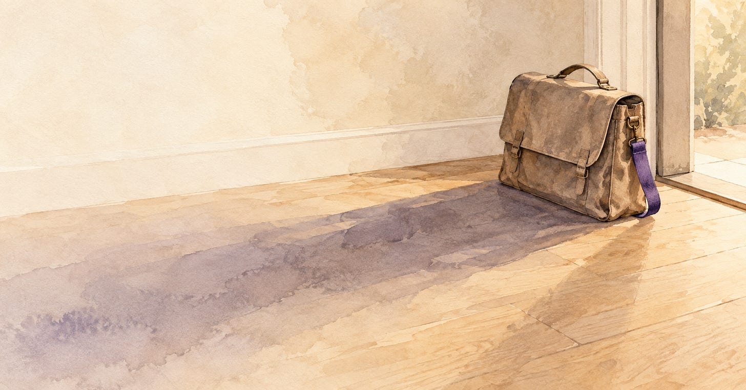 A watercolour work satchel beside a home doorway, casting a long, fading shadow across the floor.