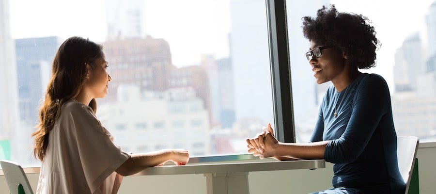 Two women talking Two women talking