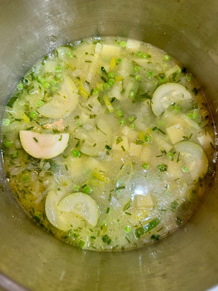 Patriot soup cooking in a stockpot; finished soup with cream and shredded carrots.