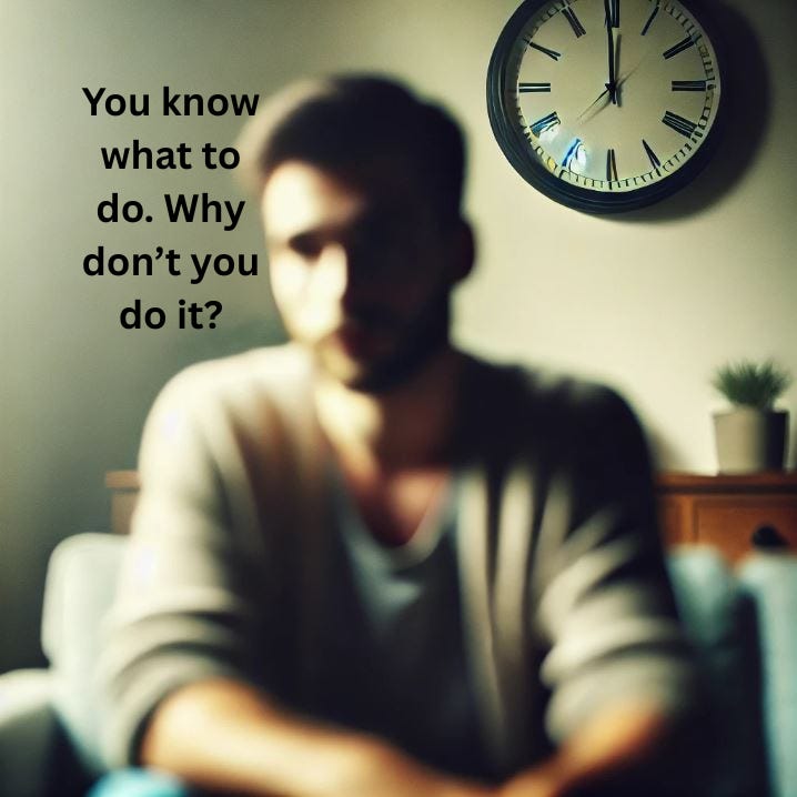 A blurred man sits on a couch in deep thought, with a clock on the wall behind him. The soft lighting and unfocused details create a sense of hesitation, reflection, and procrastination.