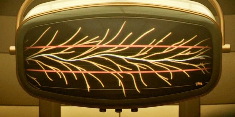 Vintage television screen in the TVA displaying a branching diagram of multiple possible histories diverging from shared paths.