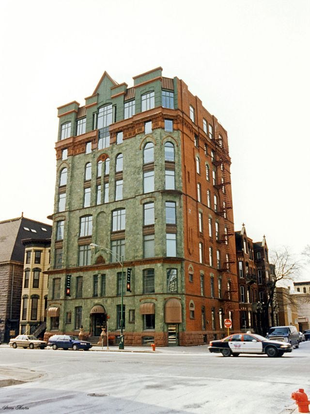 An aged apartment building standing at the corner of Dearborn and Erie in the River North neighborhood, Chicago, February 1996. An aged apartment building standing at the corner of Dearborn and Erie in the River North neighborhood, Chicago, February 1996.