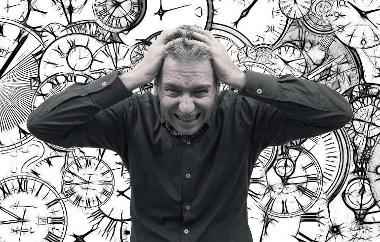 This shows a stressed man and drawings of clocks