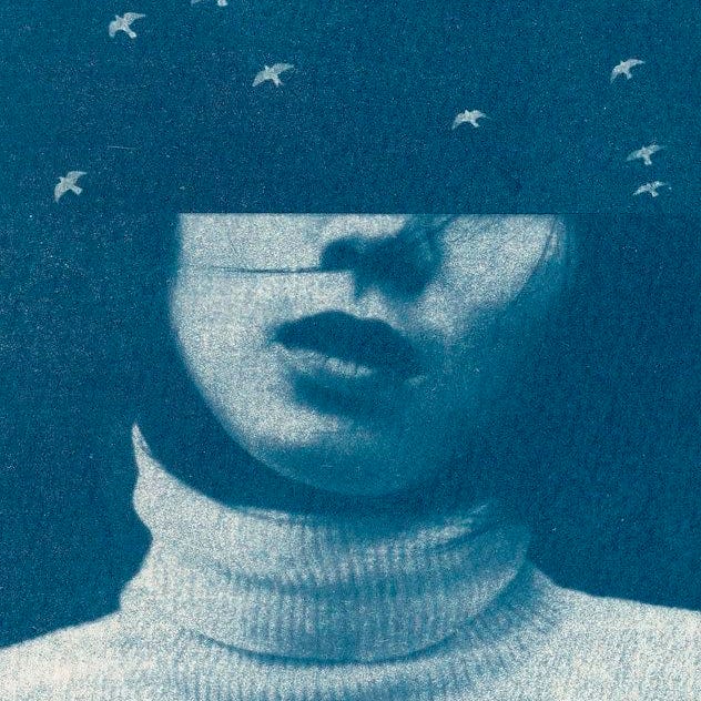 This may contain: a woman with birds on her head is looking through the hole in front of her face This may contain: a woman with birds on her head is looking through the hole in front of her face