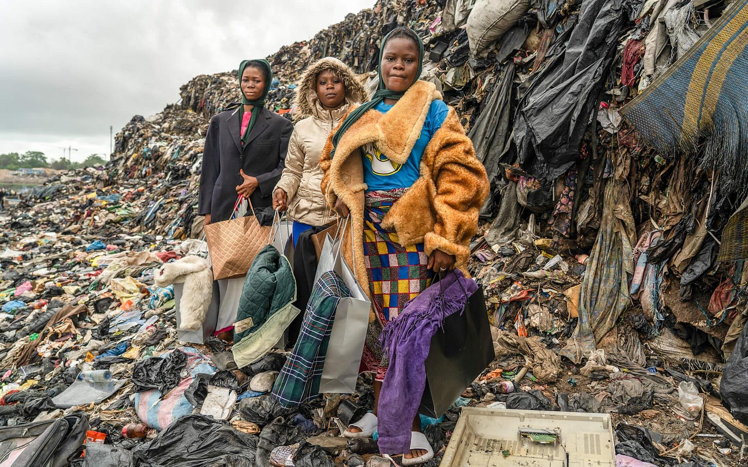A mountain of waste overlooks Kantamanto Market. From The Revival