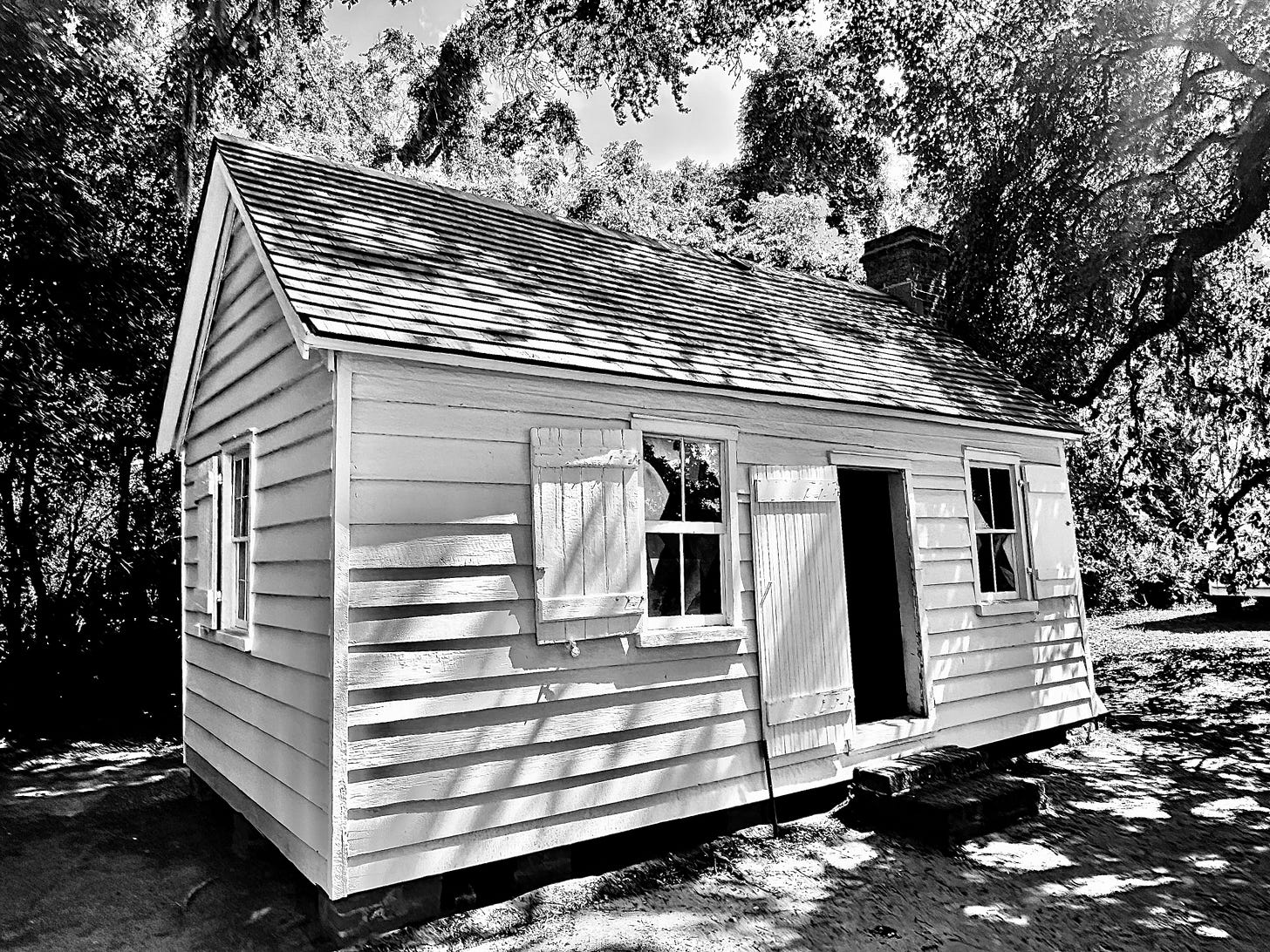 One of the remaining two-room cabins for enslaved people that was built before the McLeod plantation house. Author photograph (June 2026).