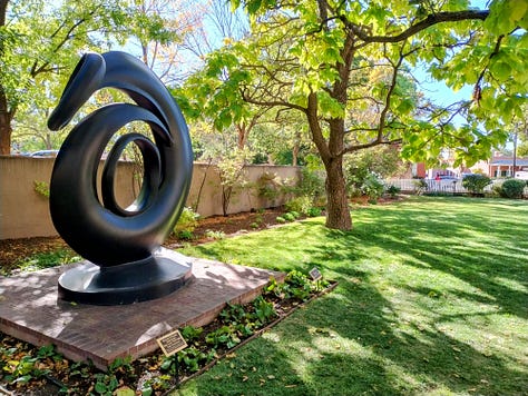 outdoor sculpture and photos of figurines from many peoples
