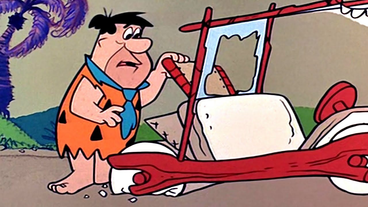 How To Change A Flat Tire | The Flintstones