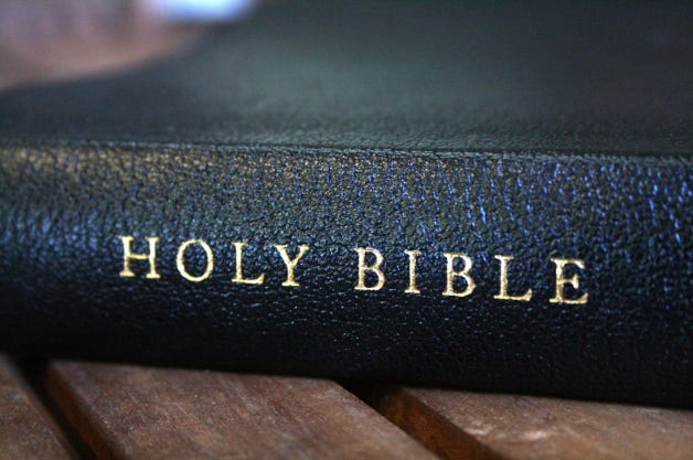 The Holy Bible, a collection of books put together by a council of people.  Among different religious groups, many Bible collections exist. 
