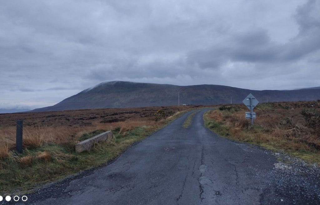 A view of a mountain to one side of the course