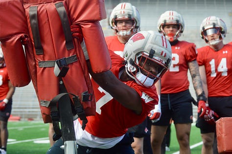 Wisconsin outside linebackers participate in individual position drills during the Badgers' spring football practice Saturday inside Camp Randall Stadium.