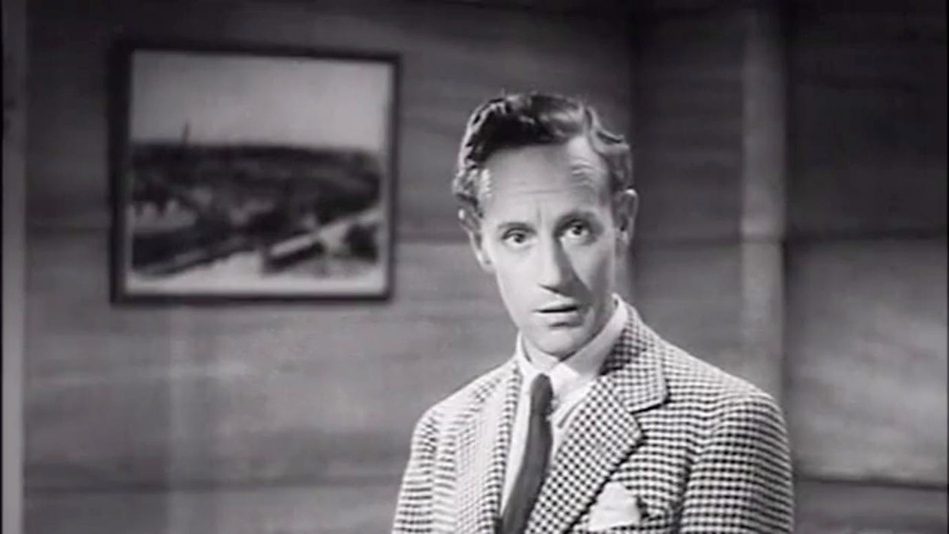 A person in a suit

AI-generated content may be incorrect.