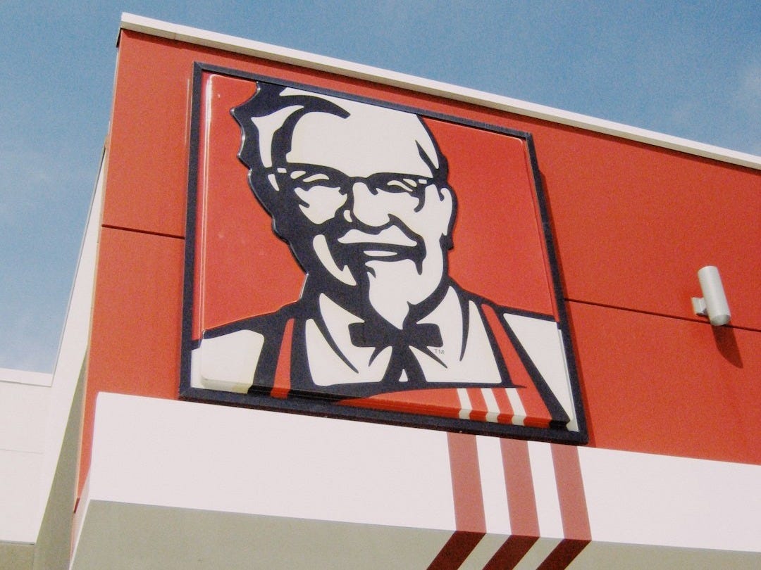 a picture of a man on the side of a building a picture of a man on the side of a building