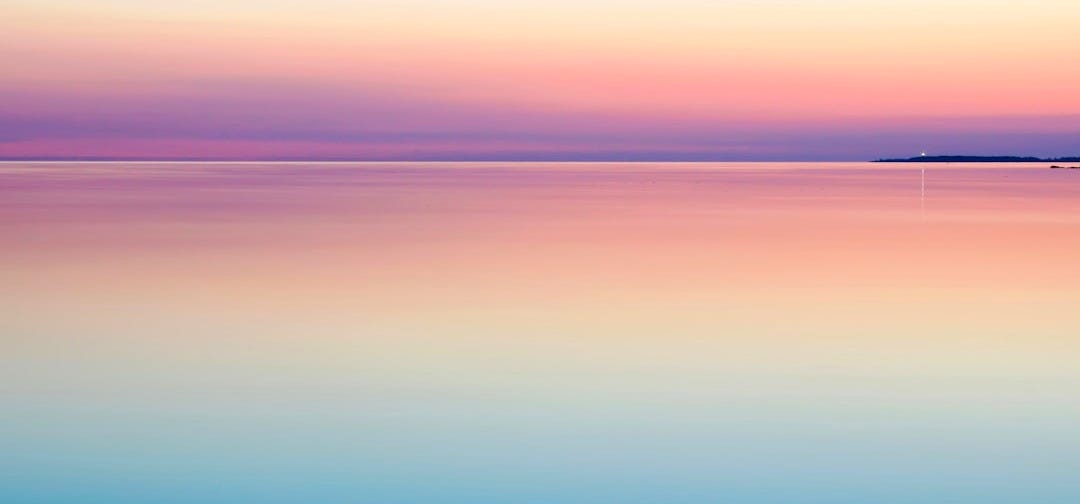 photo of blue and pink sea photo of blue and pink sea