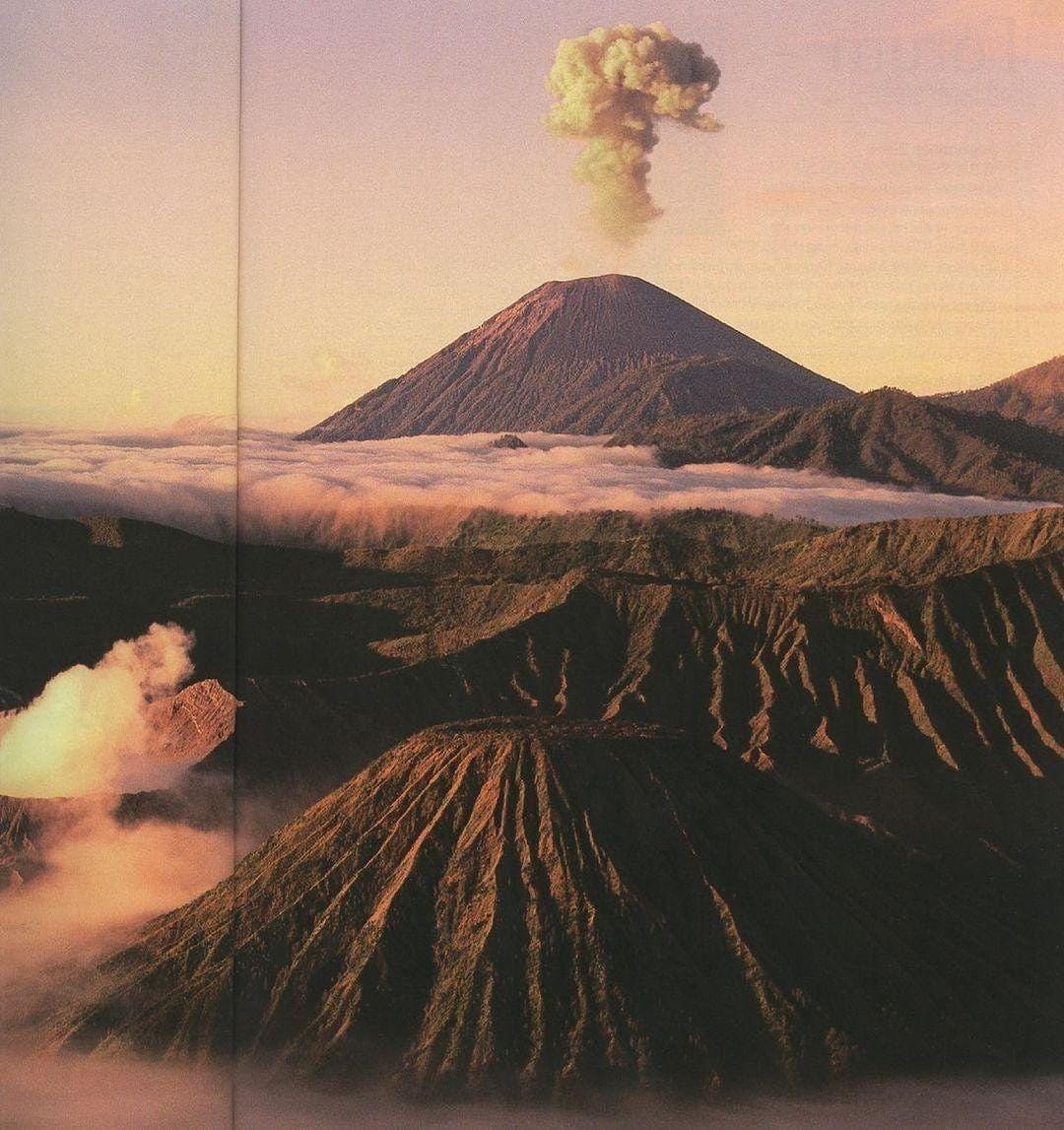 An Instagram  post added by ainsleysgrace on Dec 03, 2023. The author is @cosmos. May present: stratovolcano, volcano, sky, mountain, ecoregion.
