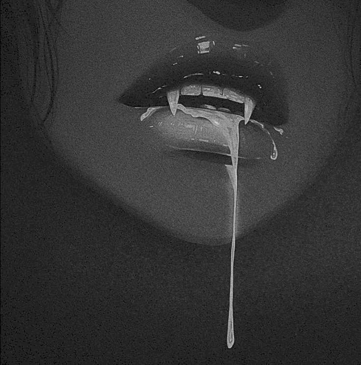 A beautiful female mouth with vampire fangs, and blood dripping from her lips.