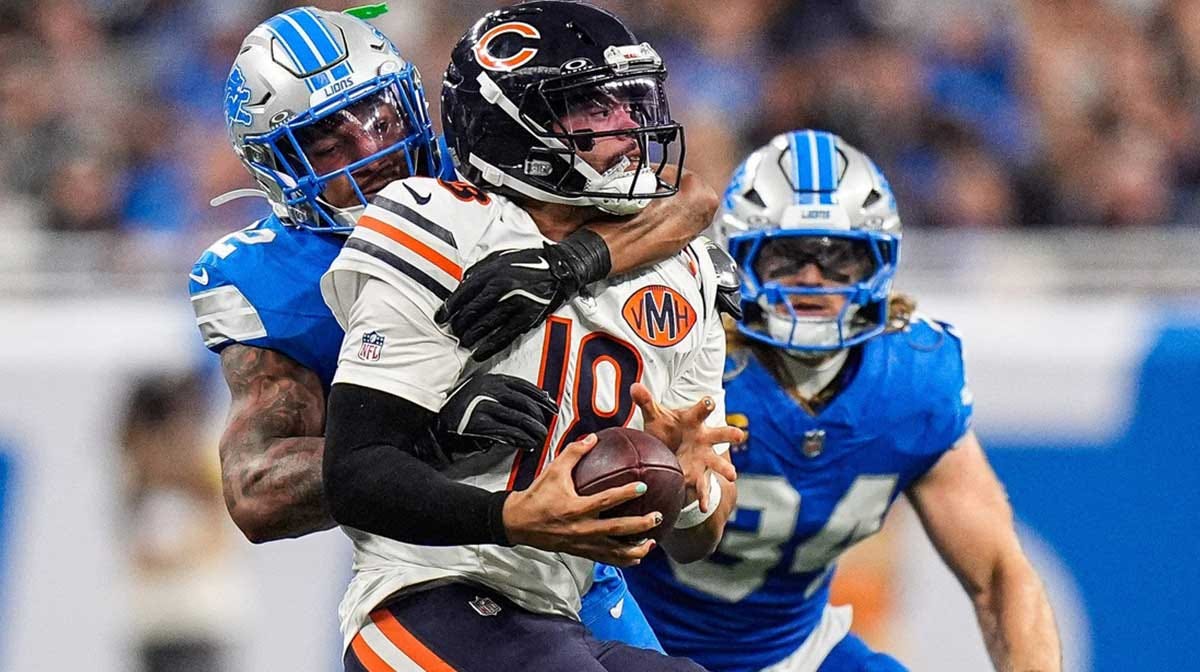 Detroit Lions safety Brian Branch (32) sacks Chicago Bears quarterback Caleb Williams (18) during the second half at Ford Field in Detroit on Sunday, Sept. 14, 2025. Detroit Lions safety Brian Branch (32) sacks Chicago Bears quarterback Caleb Williams (18) during the second half at Ford Field in Detroit on Sunday, Sept. 14, 2025.