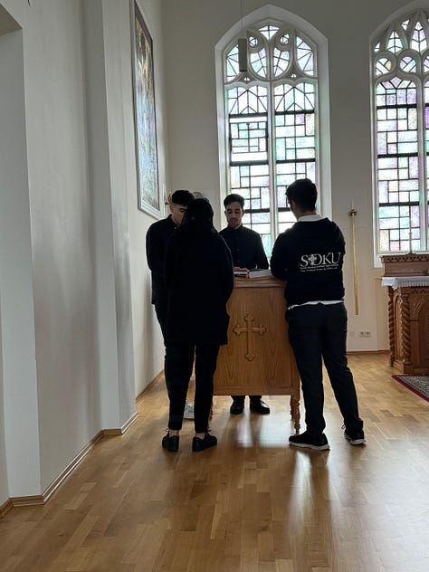 A prayer chapel with people praying