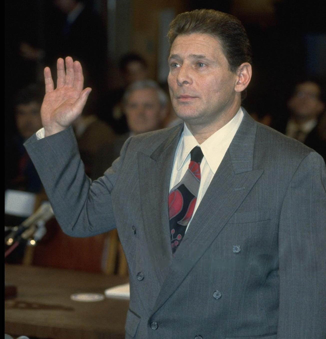 Salvatore Gravano, a hitman for John Gotti, prepares to testify in court. Despite being responsible for at least 19 murders, he would serve less than five years in prison. This came after Gravano agreed to become a key witness against Gotti and others in the Mafia, New York, 1993. Salvatore Gravano, a hitman for John Gotti, prepares to testify in court. Despite being responsible for at least 19 murders, he would serve less than five years in prison. This came after Gravano agreed to become a key witness against Gotti and others in the Mafia, New York, 1993.