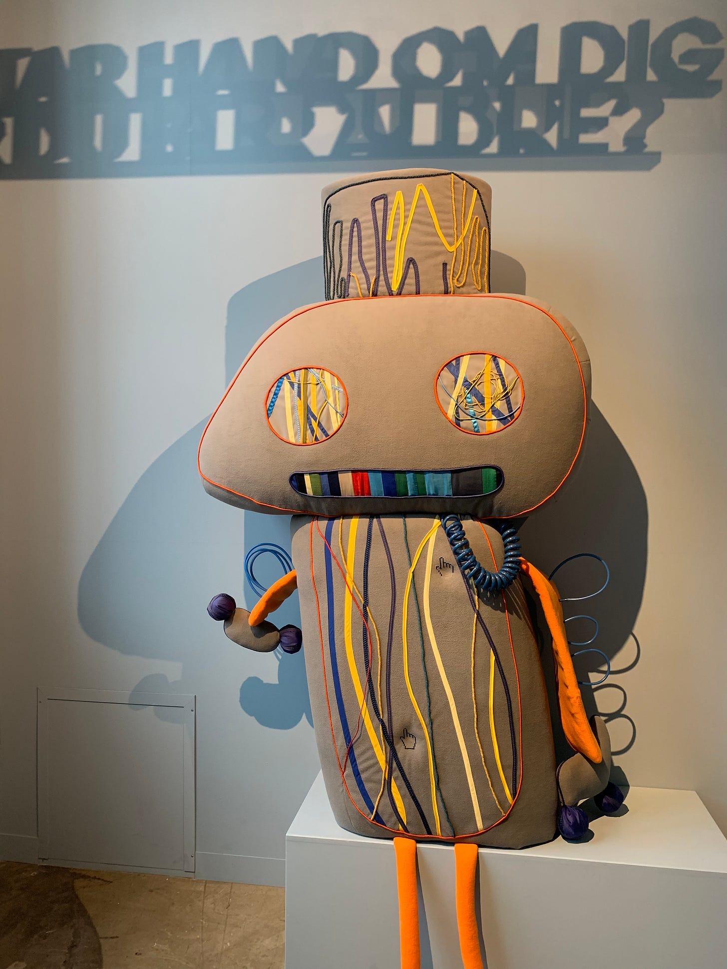 A plushie robot that is huggable, has a heartbeat, and coughs.