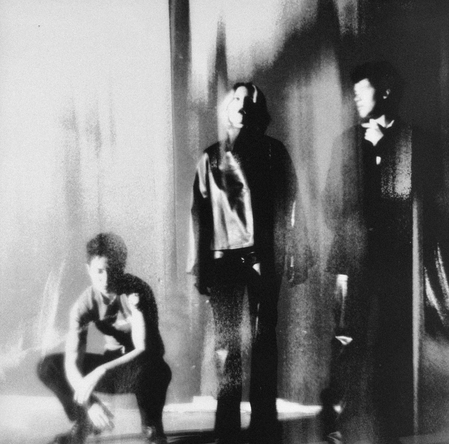 Image ID: blurred, black and white photo of MUNA