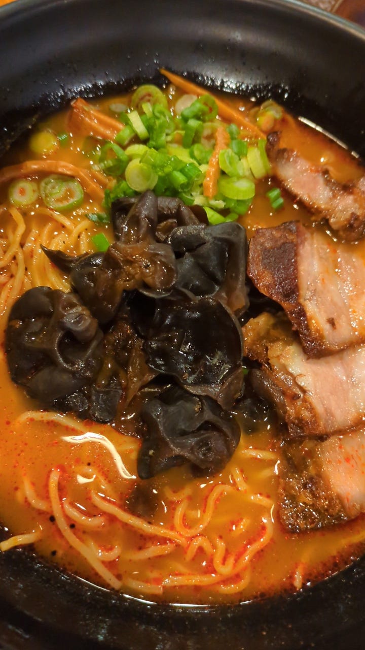 Tonkotsu red ramen bowl and cold sake from Sakuramen
