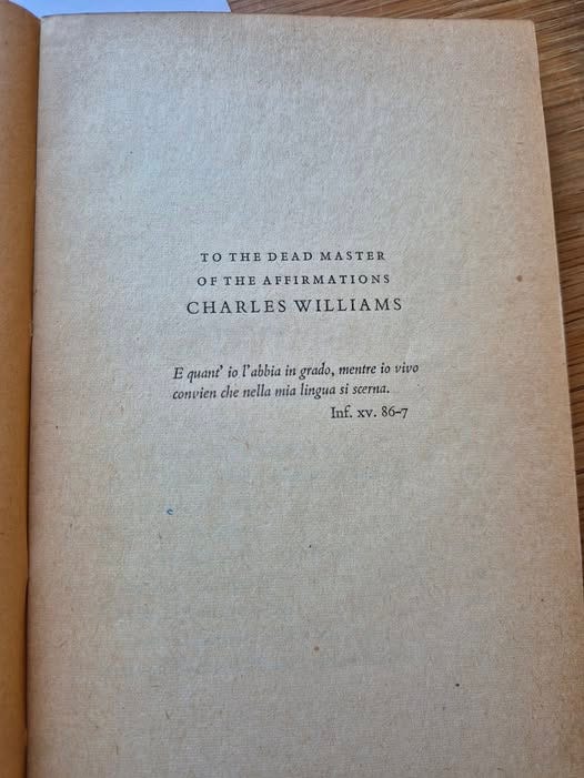 May be an image of book and text
