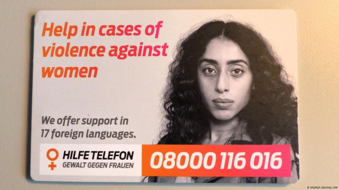 advertisement for the help line on a wall of the shelter in Koblenz