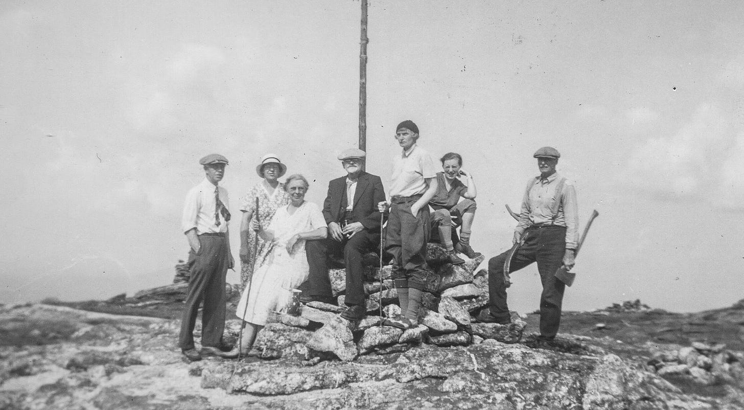 Group of people on mountain peak