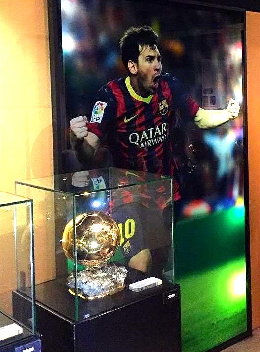 Poster of Lionel Messi with Ballon D'or Award at the Camp Nou museum in Barcelona