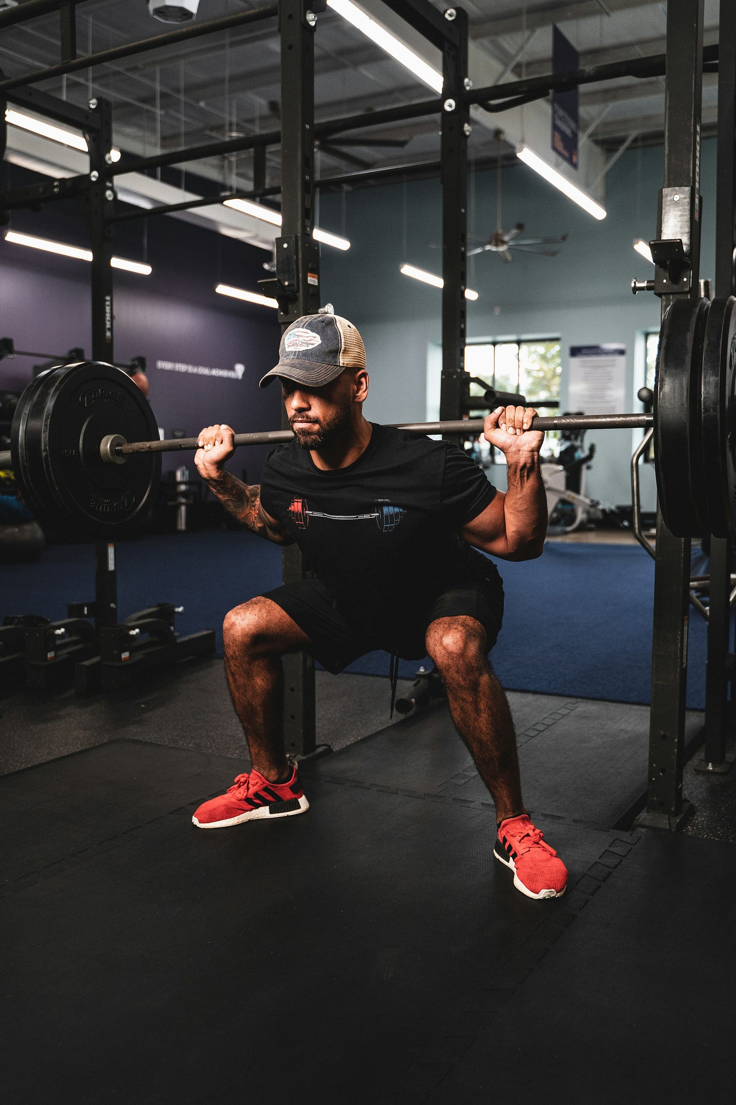 https://unsplash.com/photos/a-man-lifting-weights-5_G4i0NRLx4