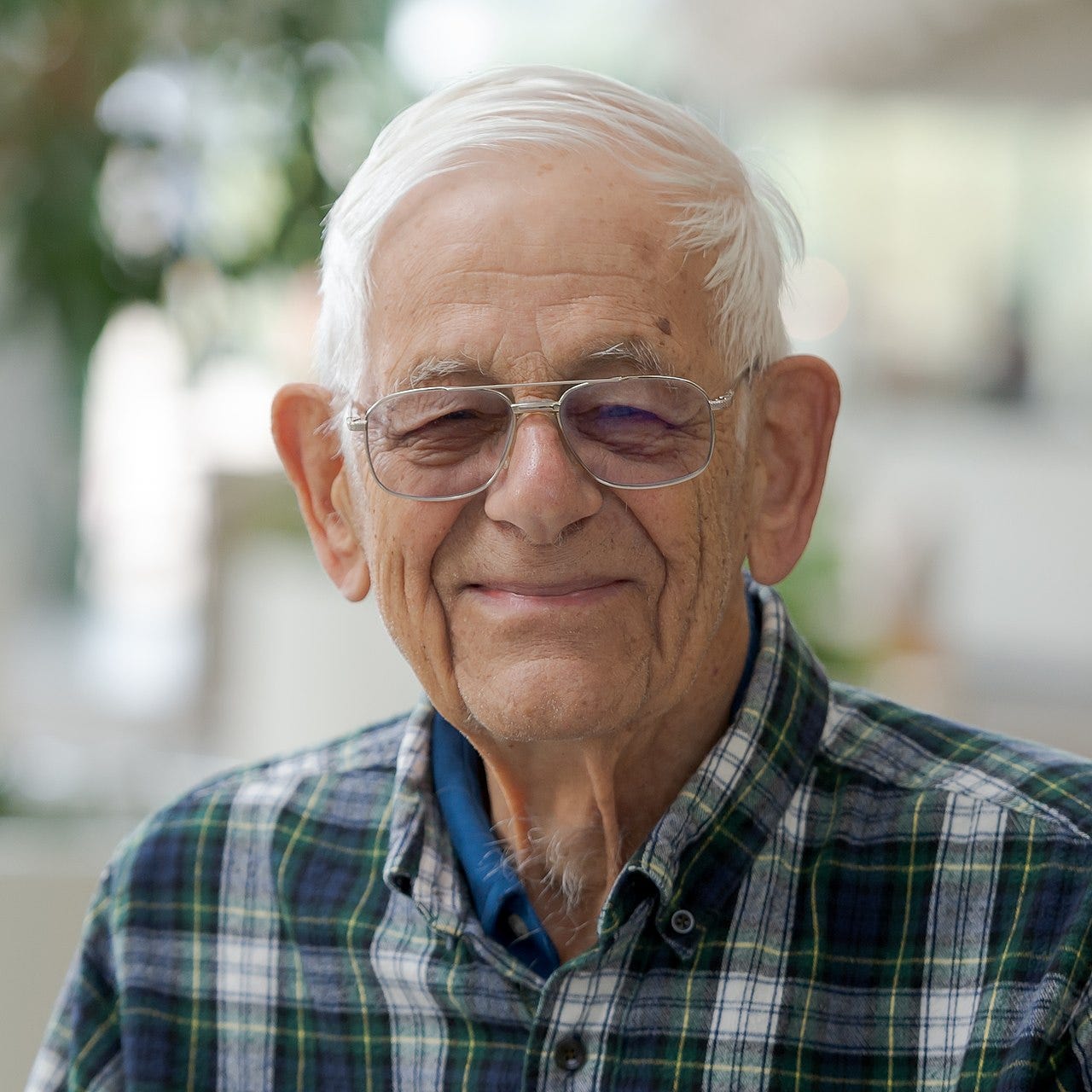 Paul Benioff profile picture with glasses. Paul A. Benioff is an American physicist who helped pioneer the field of quantum computing.
