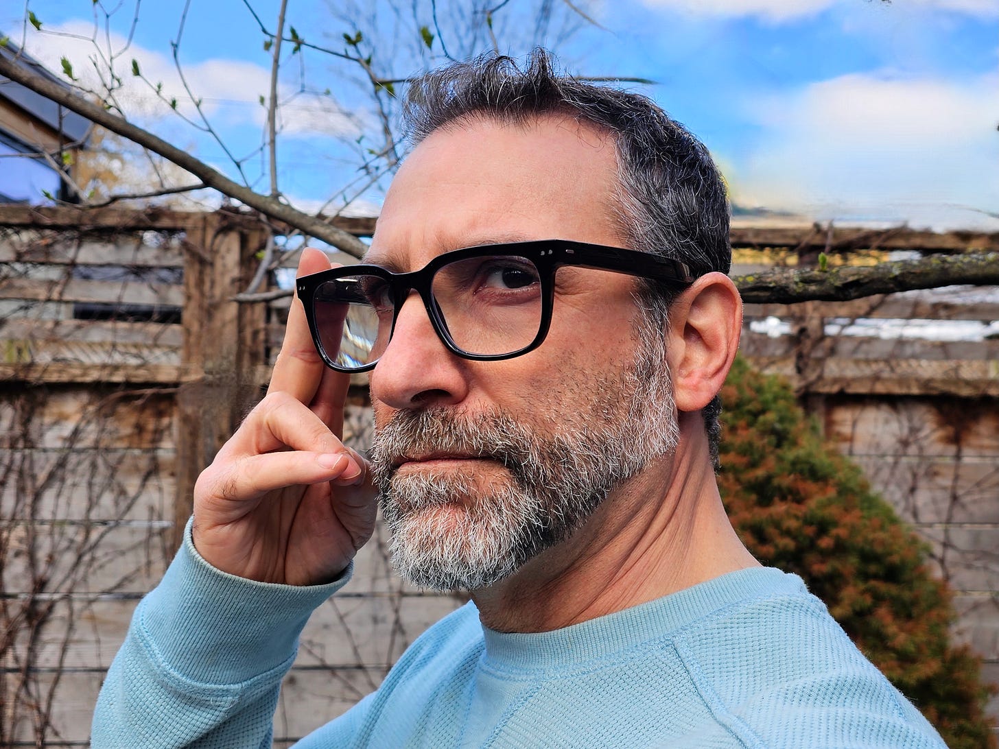 The author wearing a set of Nuance Audio Hearing Glasses.
