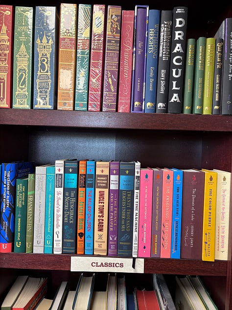 Bookshelves filled with colorful books, labeled "Classics"
