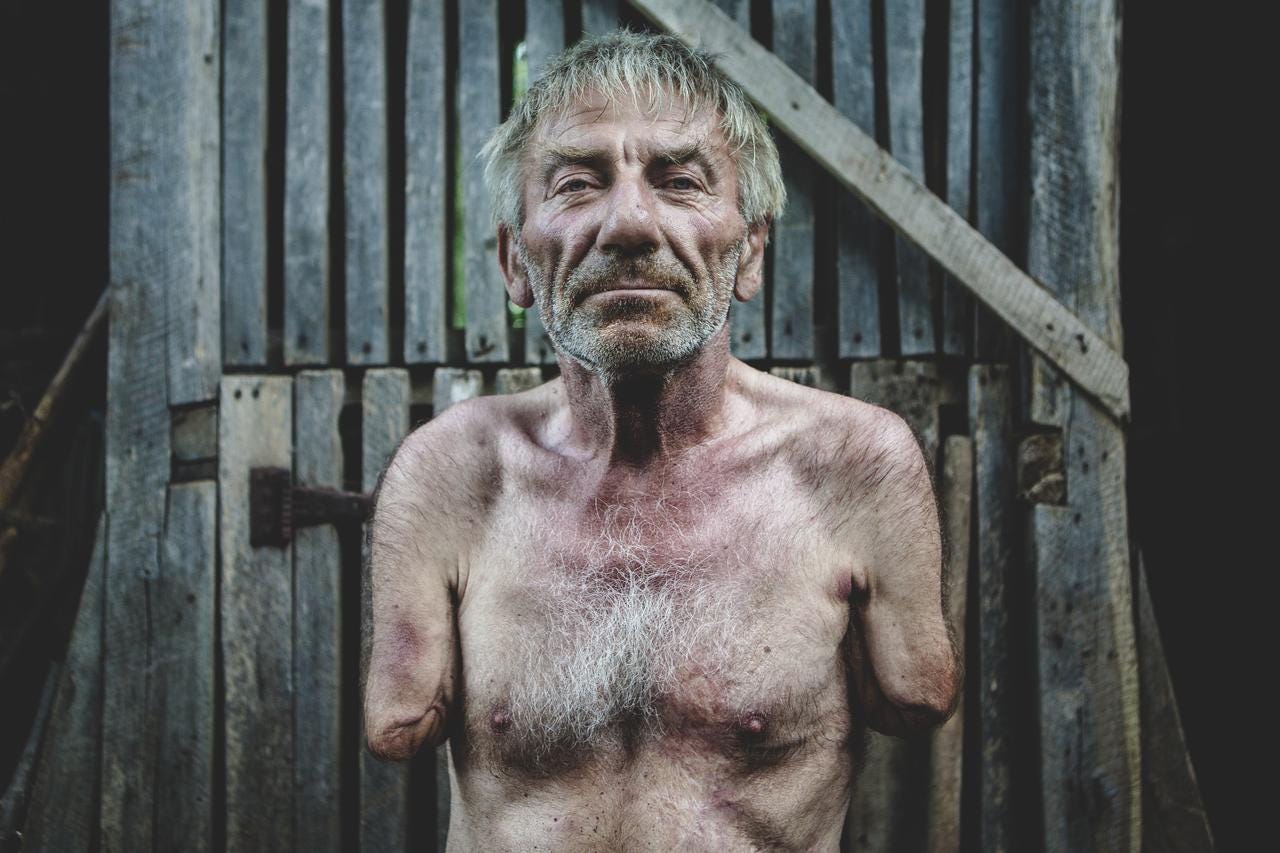 István Szuhányi outside his home in Transylvania.