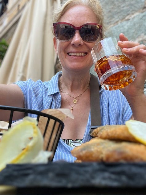 Top L-R: devouring an octopus panino, the original Ligurian focaccia, Marinda black pomodori, fresh caught sardines, Mar Ligure, fried anchovies with lemon heaven, colored-tile alimentari, fishing nets and boats on the public beach, duck face toast with my love