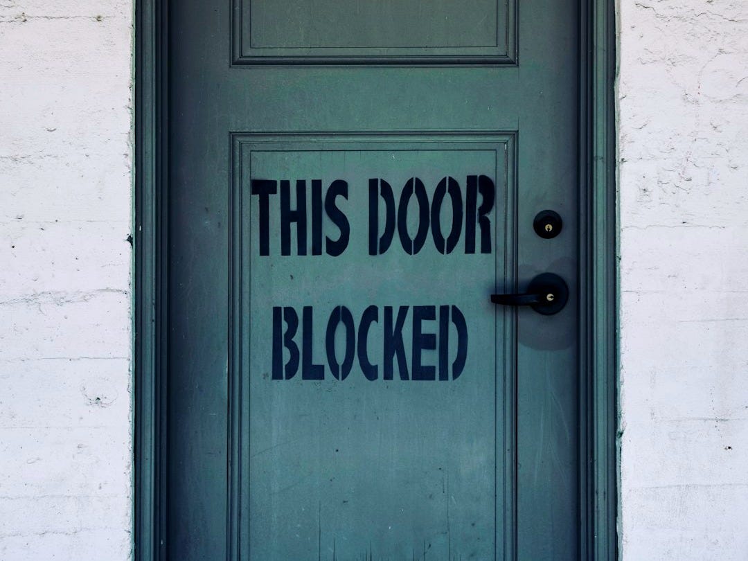 blue wooden door with white concrete wall blue wooden door with white concrete wall
