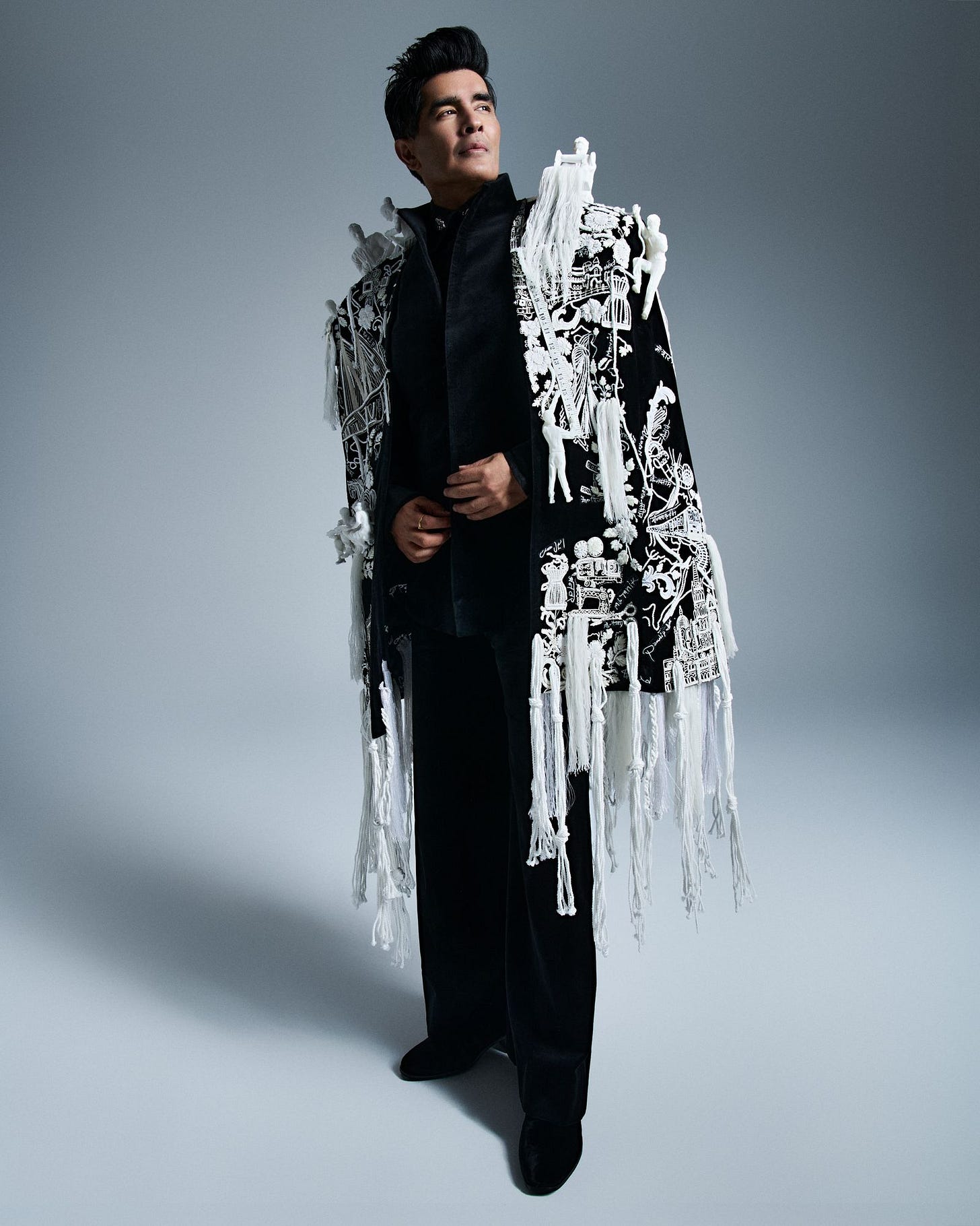 Image may contain Manish Malhotra Fashion Cape Clothing Coat Adult Person Formal Wear Suit Long Sleeve and Sleeve Image may contain Manish Malhotra Fashion Cape Clothing Coat Adult Person Formal Wear Suit Long Sleeve and Sleeve