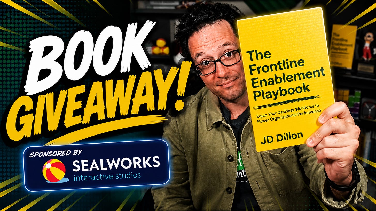 Promotional graphic for a book giveaway featuring JD Dillon holding up a copy of The Frontline Enablement Playbook. Large bold text reads "BOOK GIVEAWAY!" with a "Sponsored by Sealworks Interactive Studios" banner in the corner. The bright yellow book cover is prominently displayed against a dynamic comic book style background.