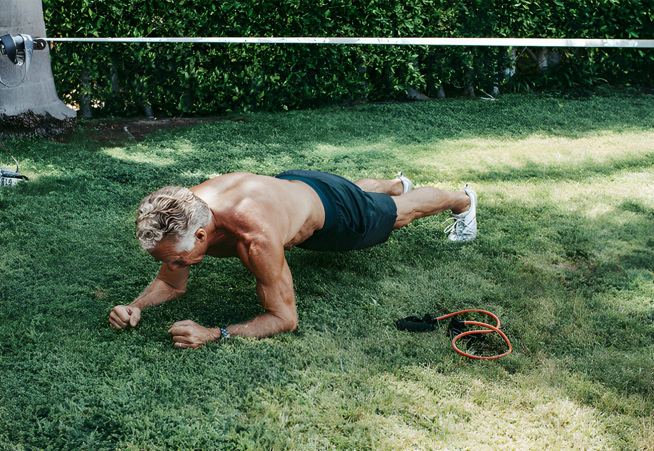 Mark demonstrating how to do a plank