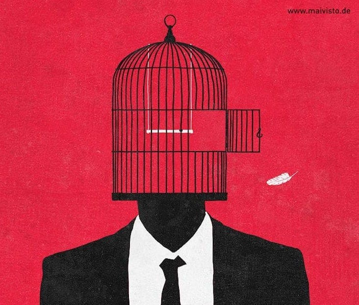 This may contain: a man in a suit with a bird cage on his head This may contain: a man in a suit with a bird cage on his head