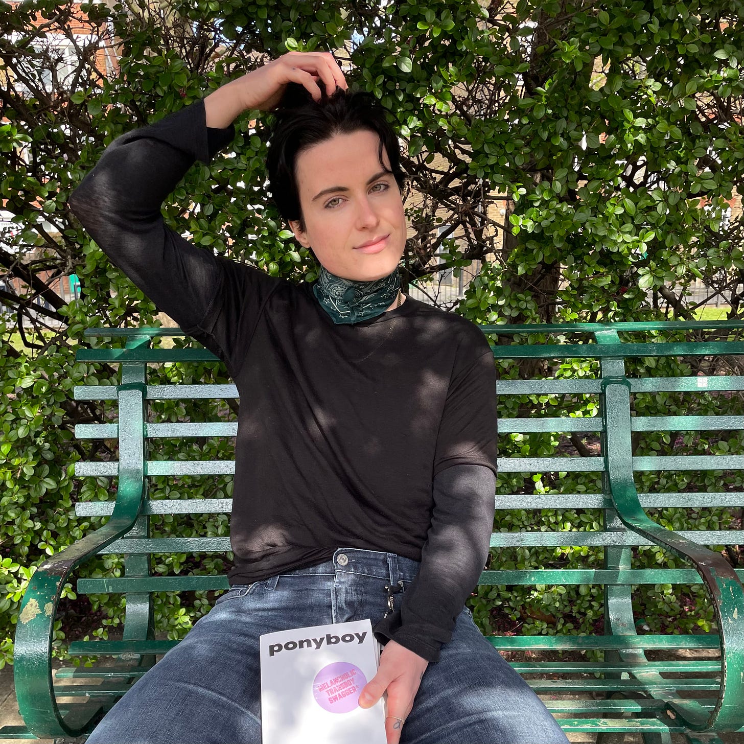 author photo of eliot duncan holding his book, "ponyboy"